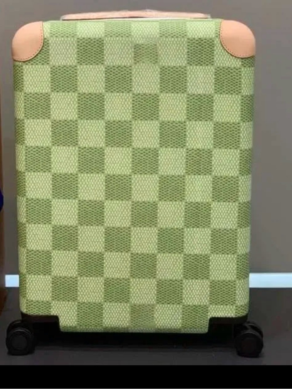 Light Green Checkered Rolling Suitcase with Tan Accents